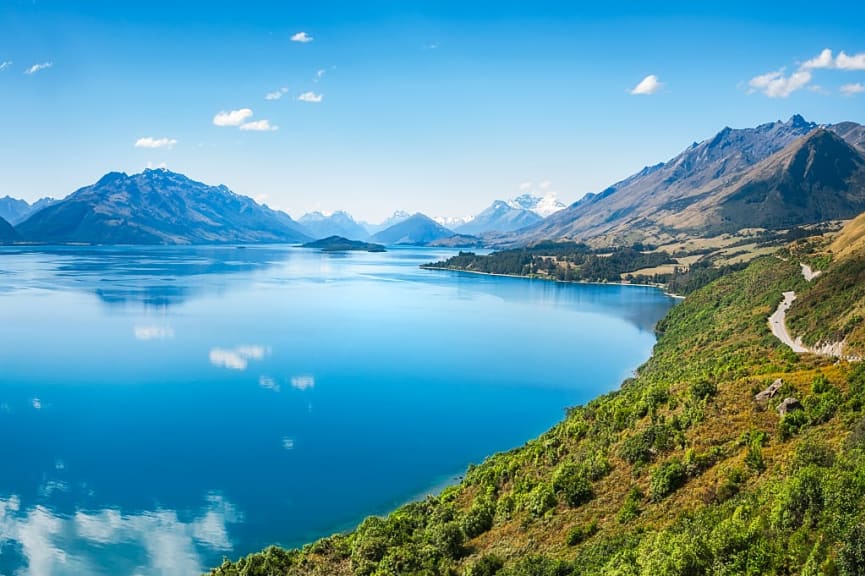 Pristine mountain lake with snow-capped peaks